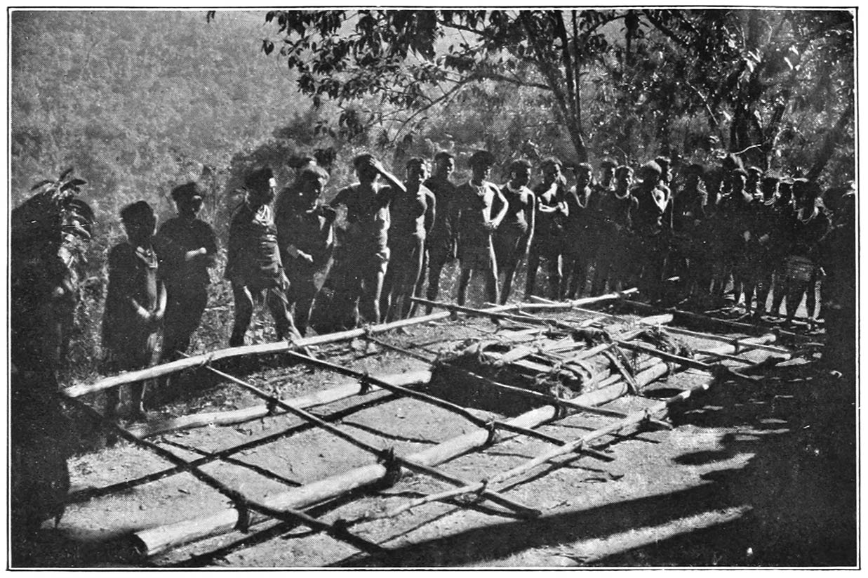 “Genna” stone tied on to a bamboo frame-work ready to be carried up to the village for the stone-dragging ceremony