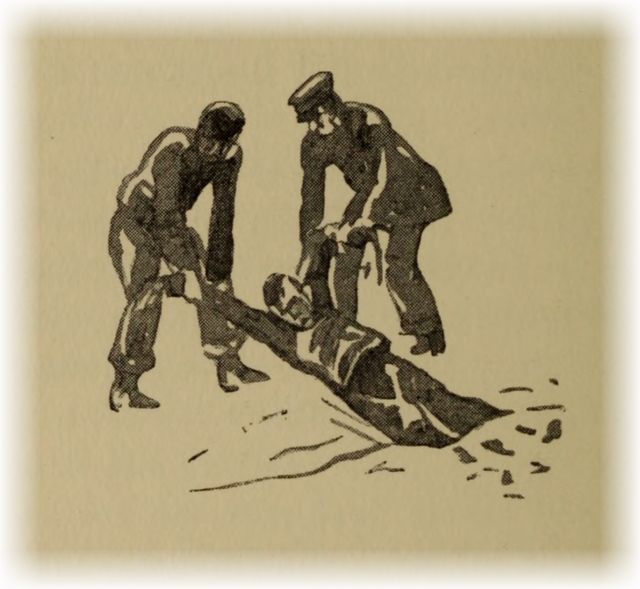 two men dragging another man from the sea