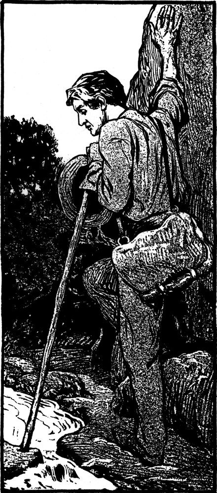 Ein Wanderer mit Wanderstab
  an einem Bach