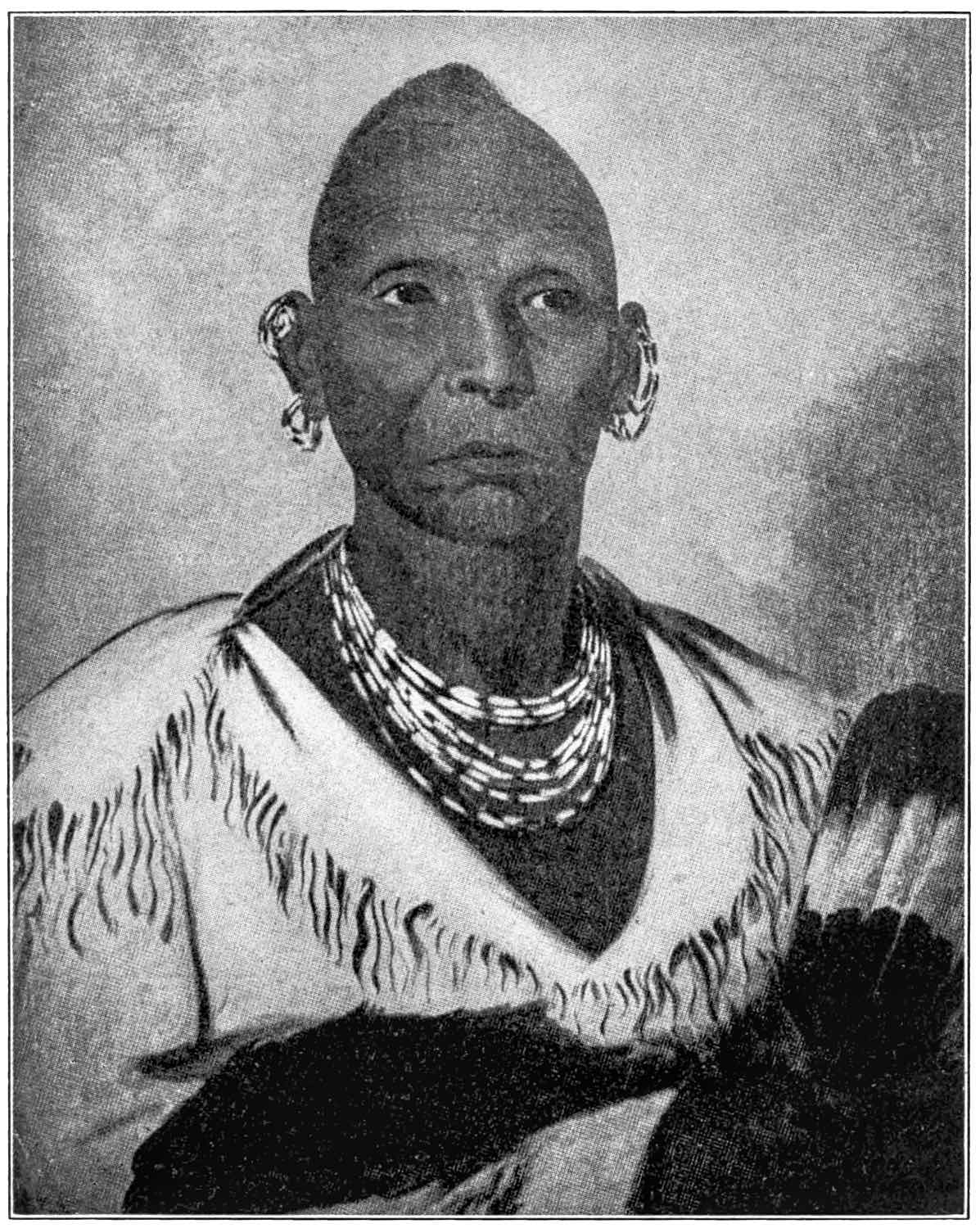 Portrait of Black Hawk, shown wearing several necklaces
as well as numerous earrings which are in both ears.