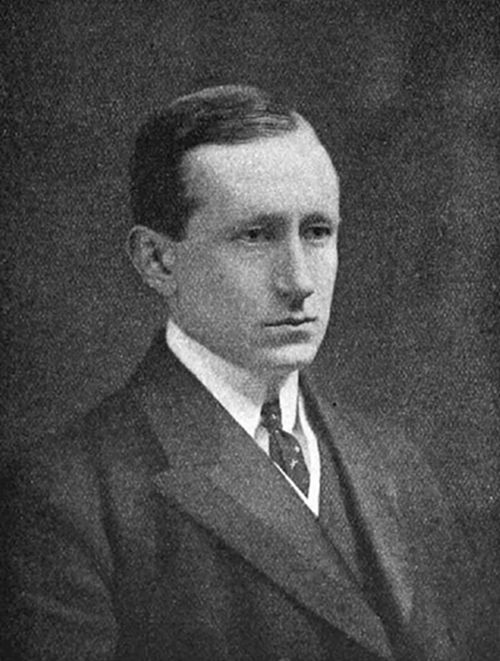 A photograph
of a young clean-shaven man in early 20th-century dress — consistent
with portraits of Guglielmo Marconi, pioneer of wireless telegraphy and
radio communication.