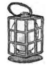 This black-and-white
drawing shows a traditional lantern. The lantern has a
rectangular box-shaped body and a flat circular base. A metal cage with
a grid pattern protects the light source, and clear glass panels fit inside
the frame. Inside the cage is a rounded bulb or candle shape. At
the top, there is a simple wire or leather loop handle for carrying.