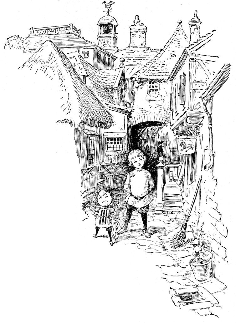 A child and a small companion standing in a cobblestone courtyard surrounded by old buildings.